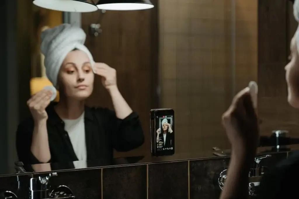 woman looking in the mirror